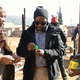Director Mandla Dube, center, on the set of 'Kalushi' with Dr. Gcina Mhlope, who portrays Mahlangu's mother.